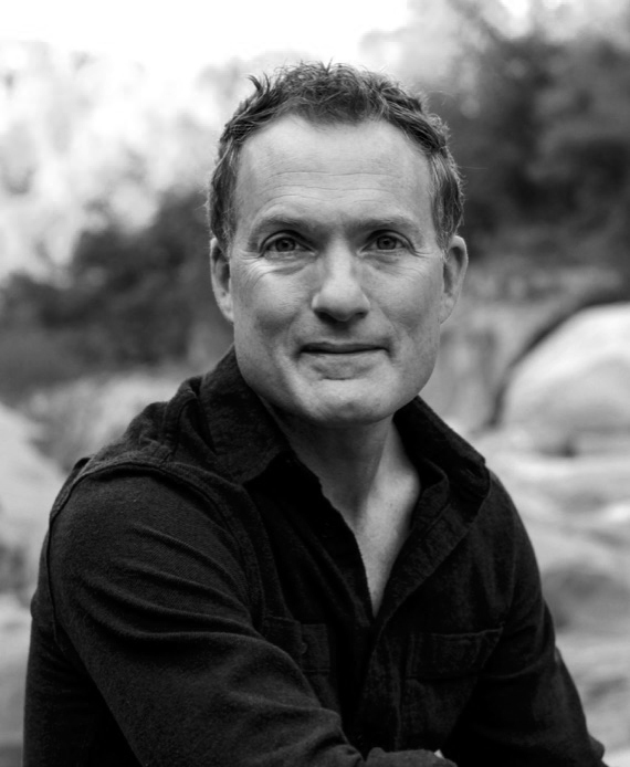 Black and white portrait of author Josh Weil