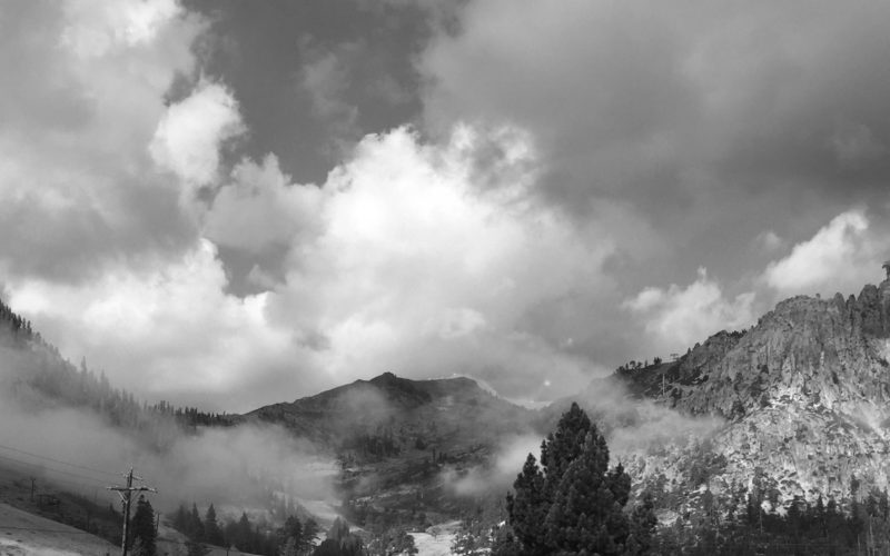 Photo of Squaw Valley with clouds clearing. Writers Workshops