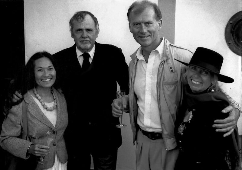 Image of four smiling people: Jeanne Wakatsuki Houston, Oakley Hall, James D. Houston, and Barbara E. Hall