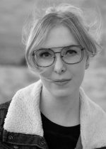 Black and white portrait of author AnnElise Hatjakes