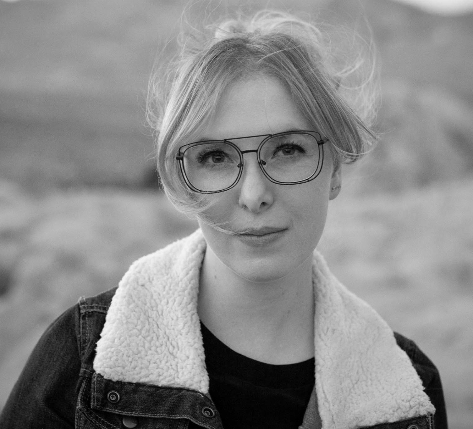 Black and white portrait of author AnnElise Hatjakes