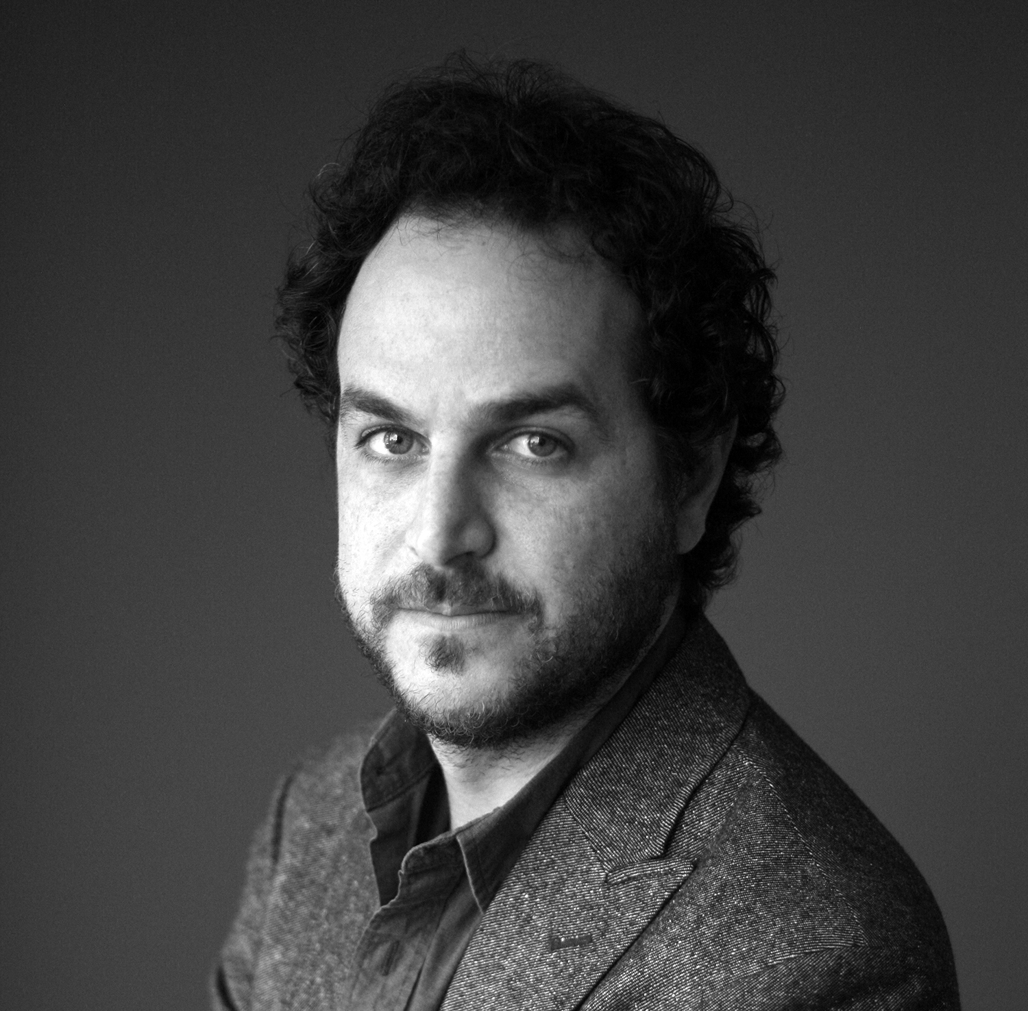 Black and white portrait of translator and editor Todd Portnowitz